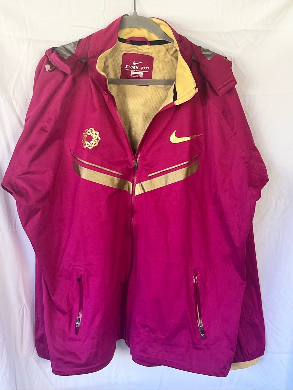 Nike Women’s Pink and Gold Storm-FIT rain Jacket